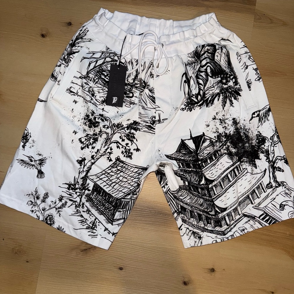 Left Point White Graphic Shorts